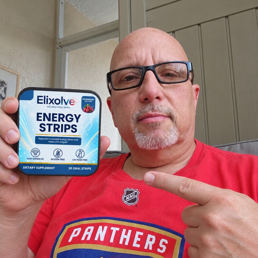 Customer in a red sports t-shirt holding an Elixolve Energy Strip tin