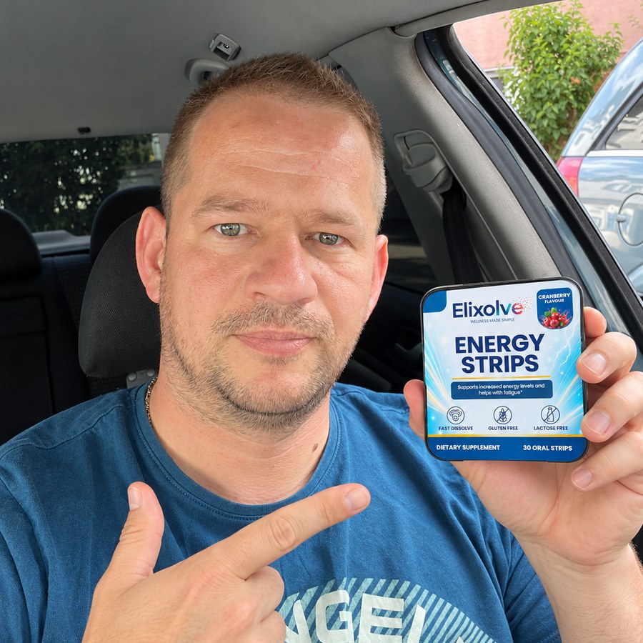 Customer seated in a car holding an Elixolve Energy Strip tin
