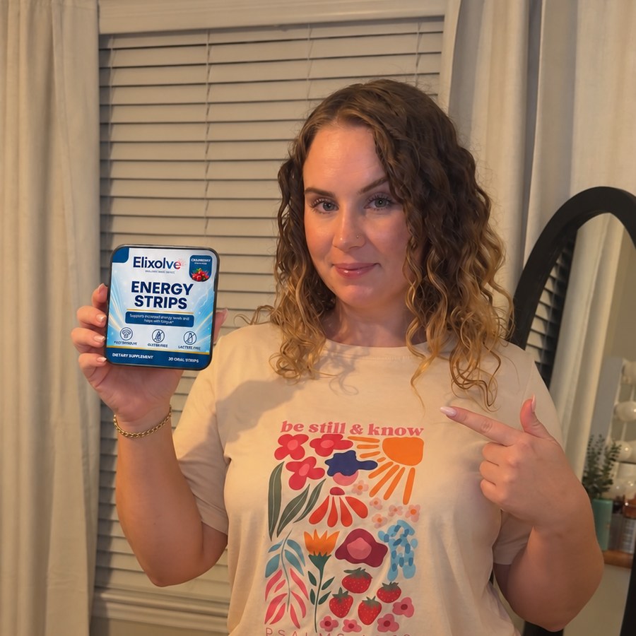 Customer at home holding an Elixolve Energy Strip tin